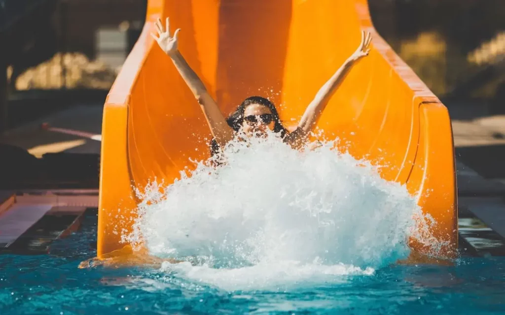 A girl enjoying water slide at michigan adventure